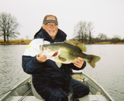 Dr. Billy Bishop with 11 lb 5 oz Club bass