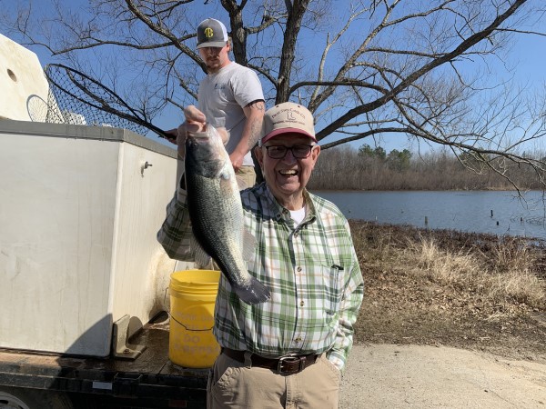 Club owner, Roy Barnett, Jr., with nice Northern Bass stocked by Davis Fish Farm, February, 2022.
